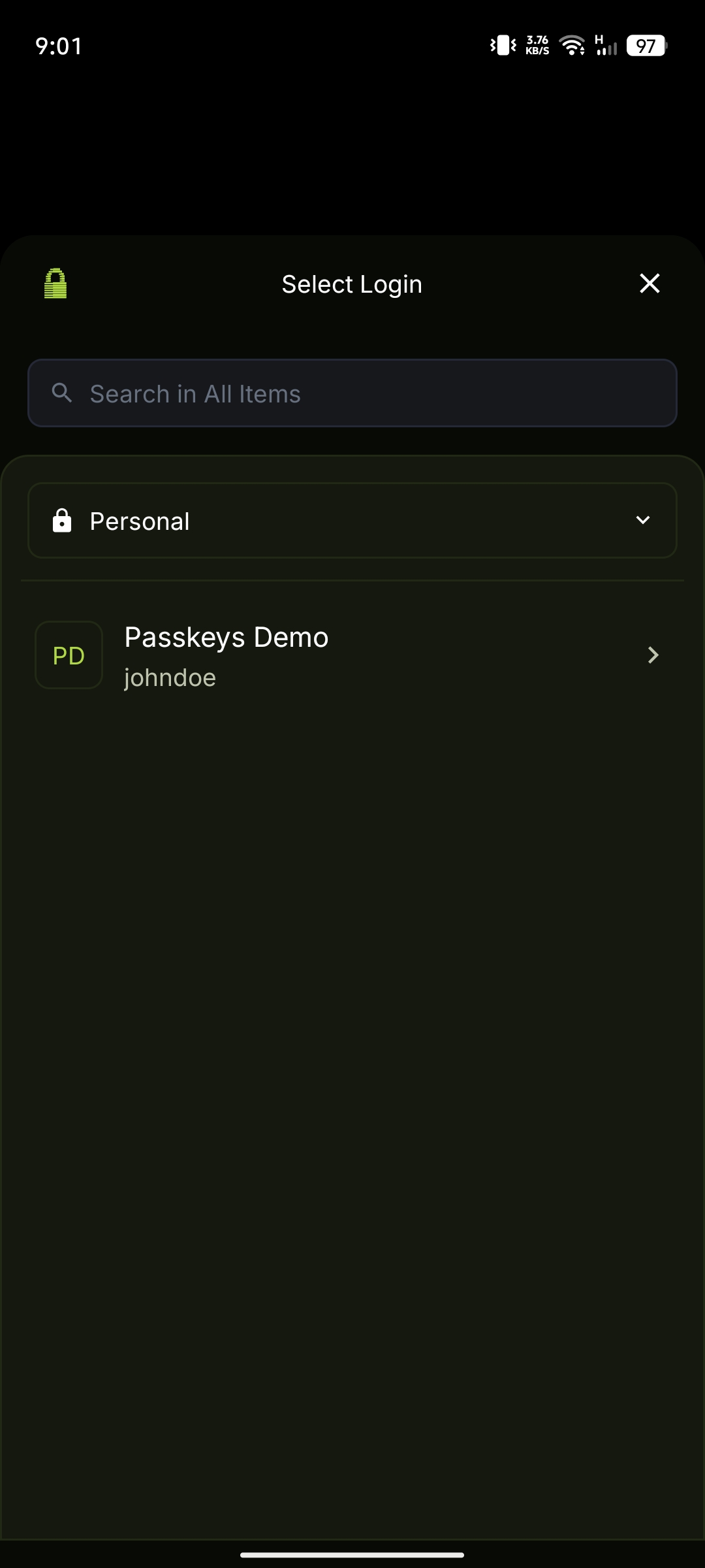 Select Login dialog showing vault dropdown and passkey entry